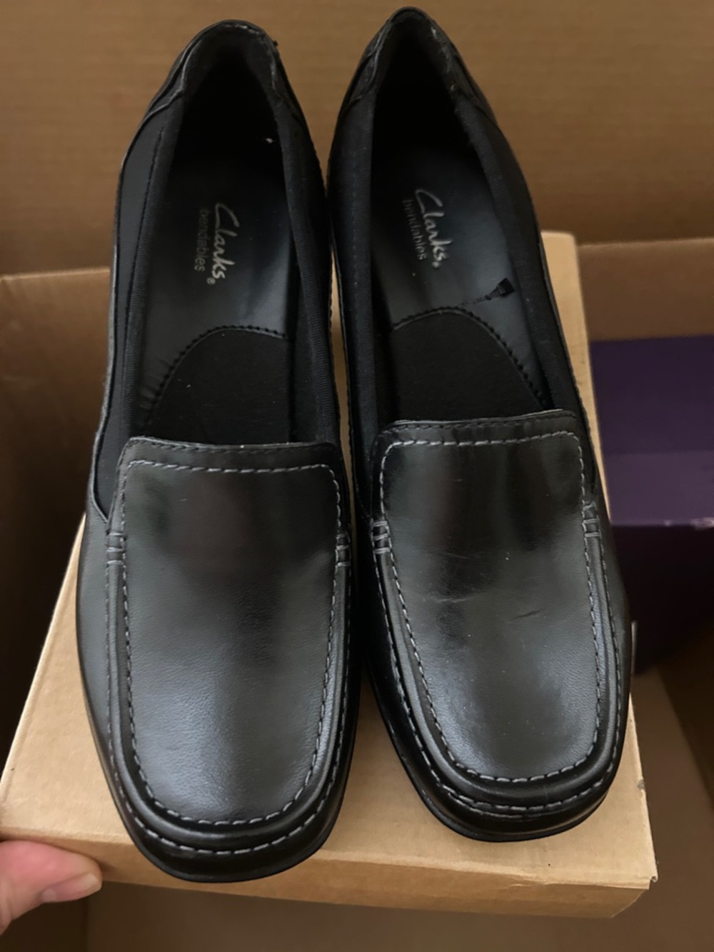 Clarks women’s 
Black Leather Slip-On Loafers - Smooth Finish